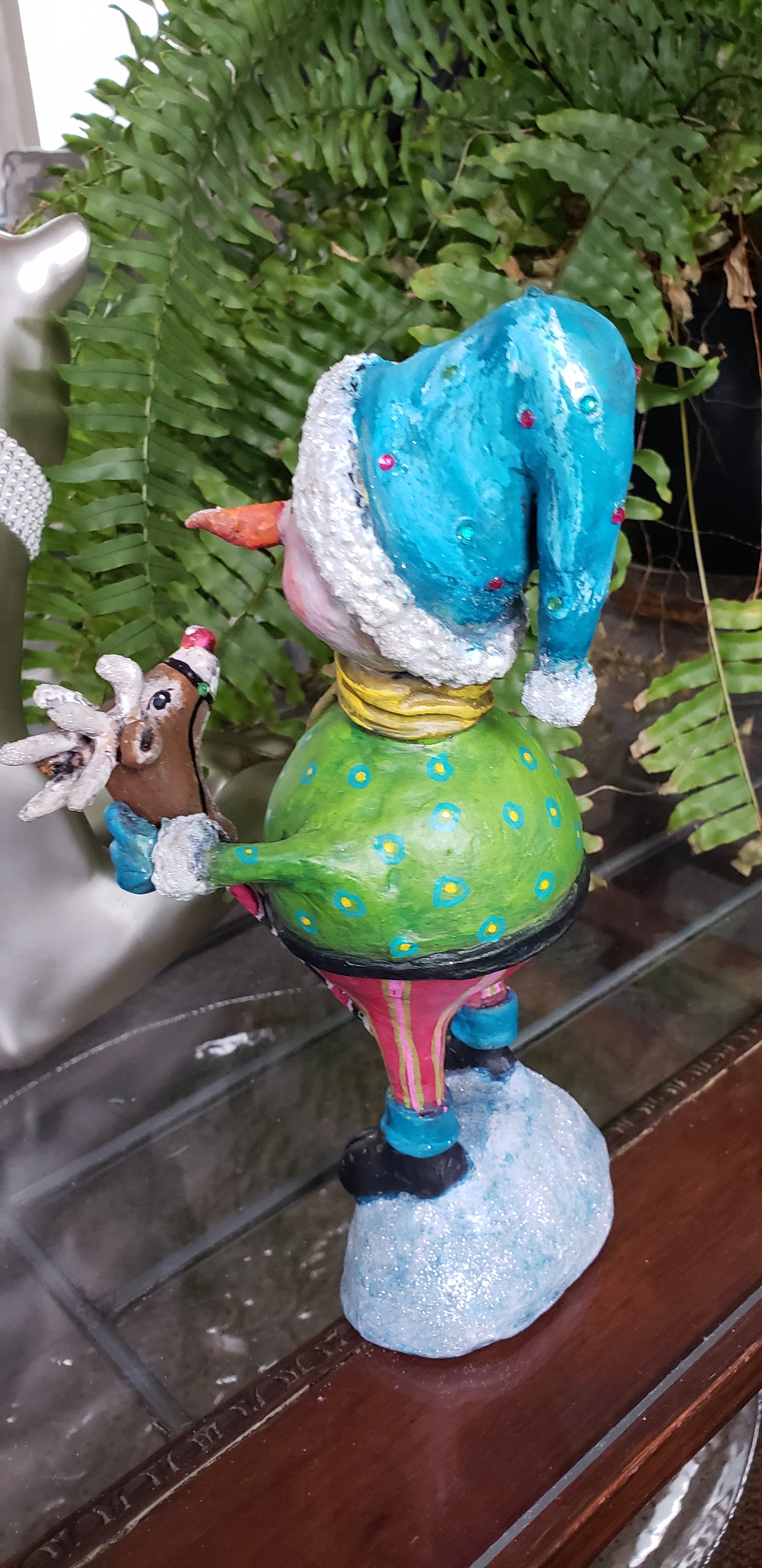 Colorful clown figurine with aogo deer
