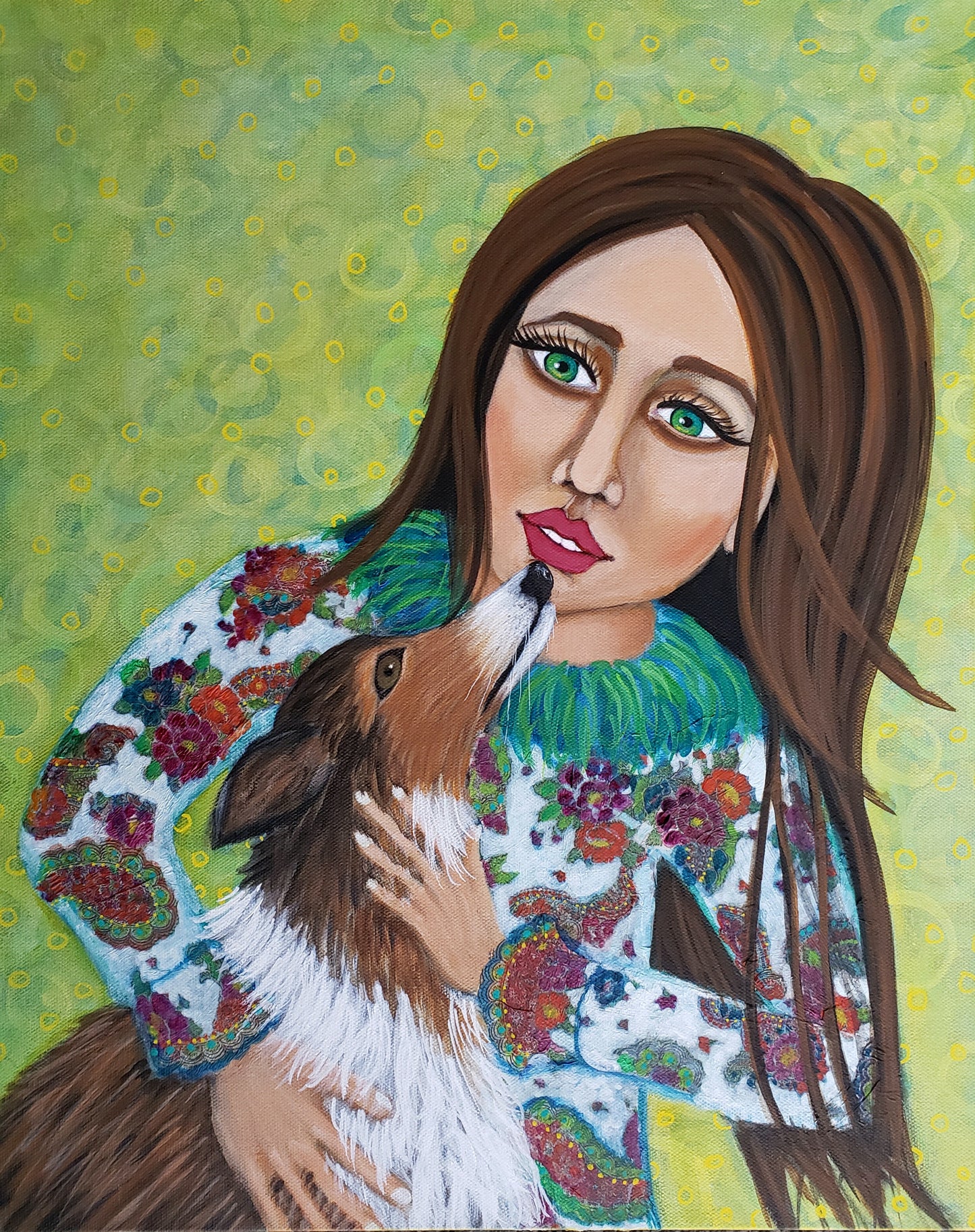 Painting of a woman holding a Sheltie with a floral patterned shawl against a green background