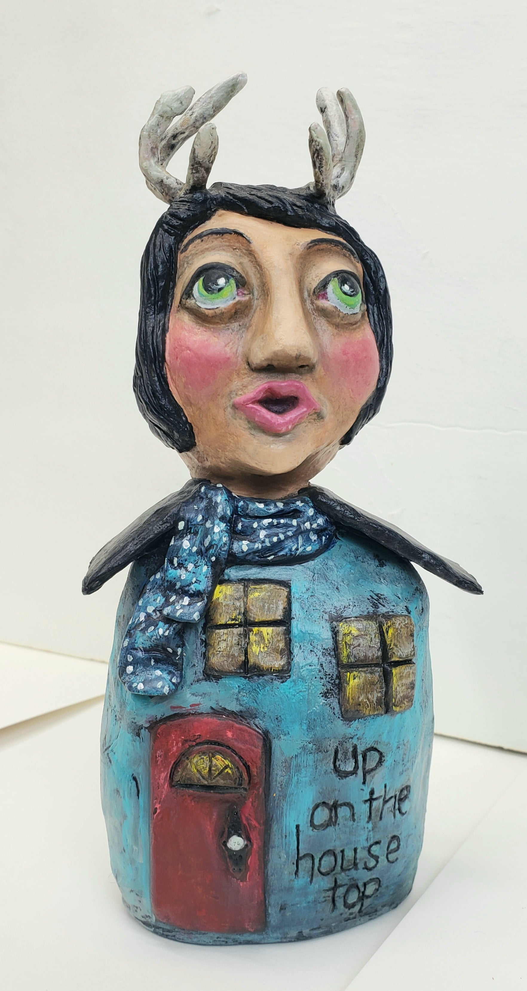 Christmas themed doll with antlers