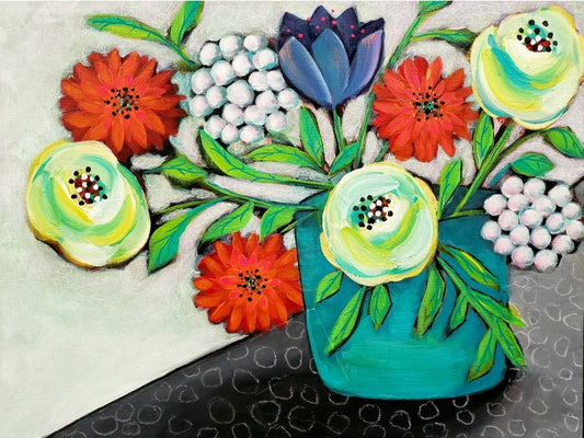 Colorful vase of abstract flowers on a textured table